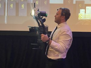 Foundation Treasurer Tyler Eichorst with wireless handheld camera action